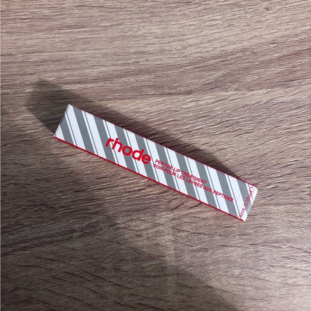 RHODE Peppermint Glaze Lip Treatment in Gray and Red